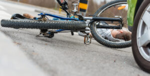 A Fresno bicycle injury was reported following a collision between a white GMC SUV and a bicycle.